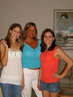 This is a photo of me, my mom, and my older sister at my aunt's house gettting together because it h