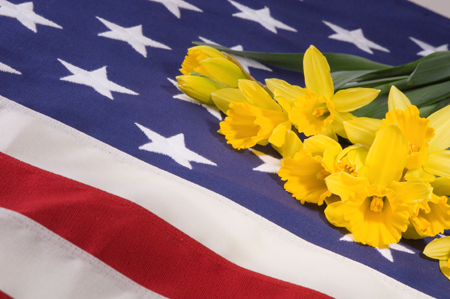 US flag and flowers